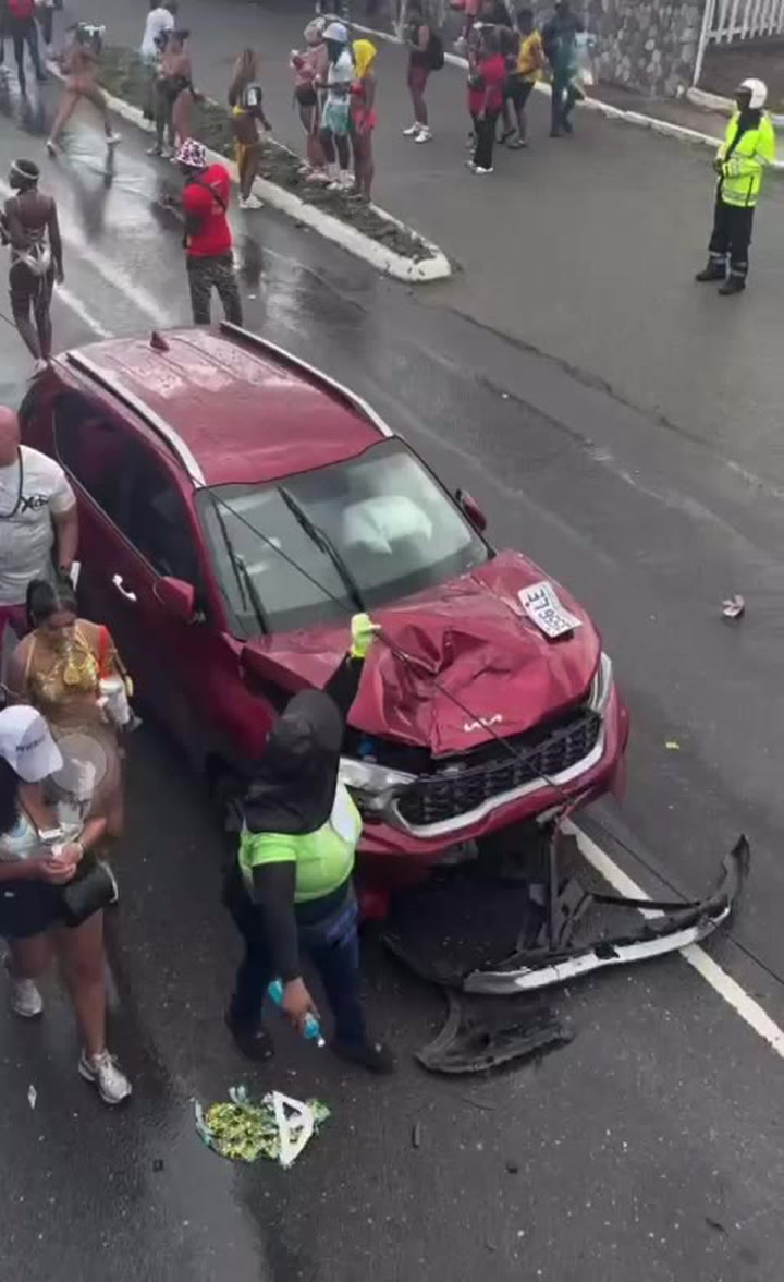 ATV rider performing stunt crashes into vehicle during carnival festivities