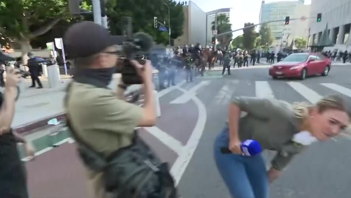 Watch: Australian reporter hit by nonlethal round during live report from LA immigration protests